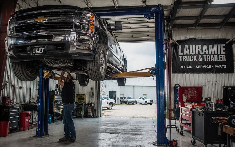 Truck on the lift for auto repair at Lauramie Truck & Trailer