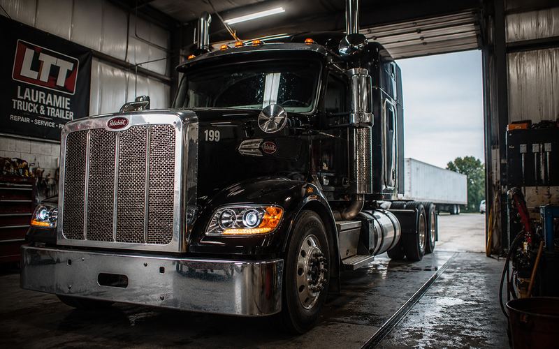Semi tractor in the bay for diesel and heavy truck repair